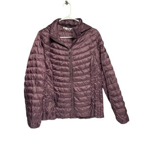 HeatKeep size medium puffer coat dark purple color does have a flaw on arm